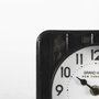 69487 - Karl 6.0L x 3.0W x 6.8H Rustic Black Iron Rounded Square Table Clock