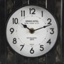 69487 - Karl 6.0L x 3.0W x 6.8H Rustic Black Iron Rounded Square Table Clock