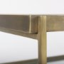 69783 - Trey 56.0L x 32.0W x 17.0H Gold Metal W/Glass Coffee table