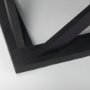 69743 - Forsey 48.0L x 28.0W x 17.5H Black Wood Rectangular Coffee Table