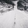 15461 - Road to Old West BW by Nathan Larson a Hand Embellished Framed Photo Art Print Matted under Glass